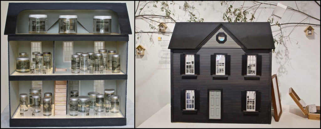 sculpture with dollhouse and jars