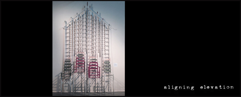 Sculpture Aligning Elevation made up of 4 heirloom chairs altered with stilts for legs and ladder backs that connect together resembling a house with roof